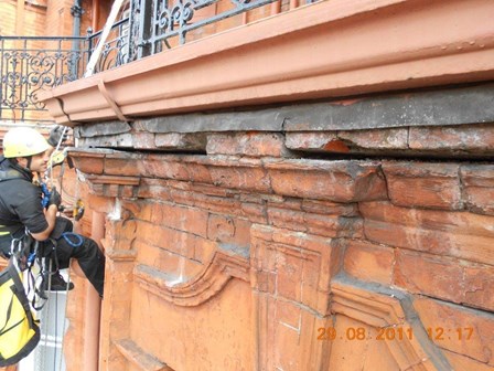 Rope access survey carried out at Claridges Hotel, London, England.  Photo shows some of the damage to the existing masonry