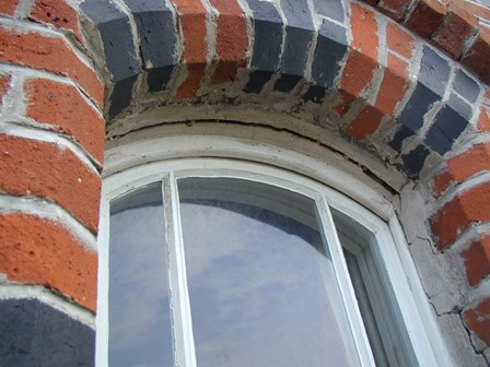 Replacement wall ties required.  Cracks in walls around window arch, at Magilligan, Co. Londonderry, NI
