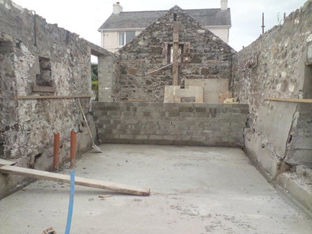 Barn portion of dwelling is partially a ground retaining structure; cavity drain basement waterproofing at Portrush, Co. Antrim, Northern Ireland, NI