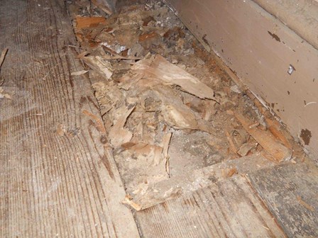 The flooring has been affected by the damp and wood rot, and has started to crumble, at Richhill Castle, Co. Armagh, Northern Ireland, NI