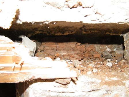 Dry rot signs in roof timbers; dry, red, crumbly wood, Belfast, Northern Ireland
